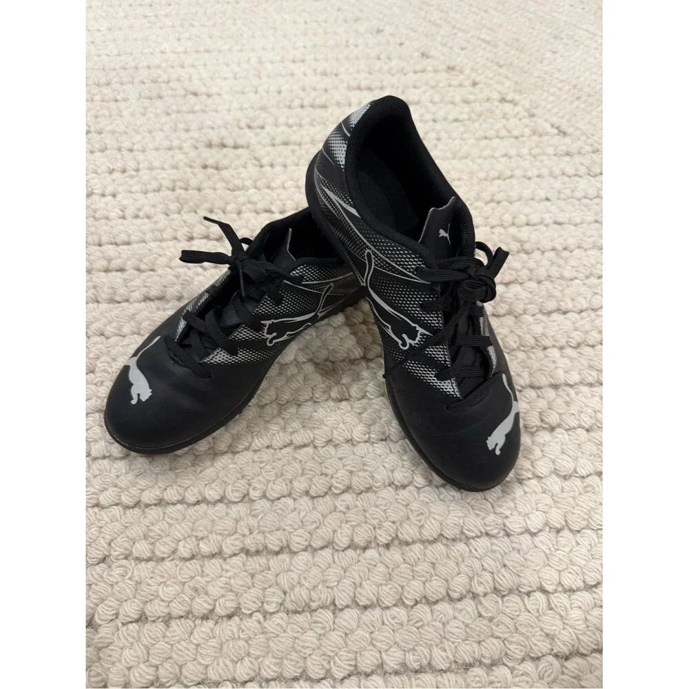 Puma Youth Black Athletic Turf Soccer Shoes with Silver Accents